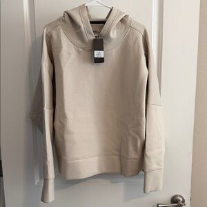 Unrl Women's Hooded Sweatshirt in Light Beige